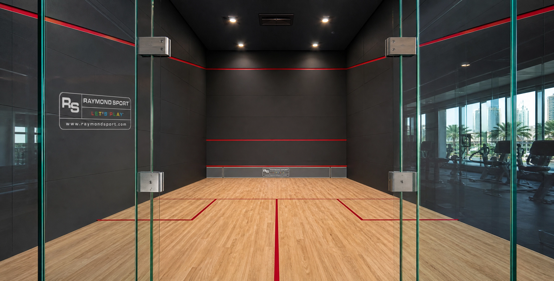 Prefabricated panel wall squash court system installed in Dubai by Raymond Sport