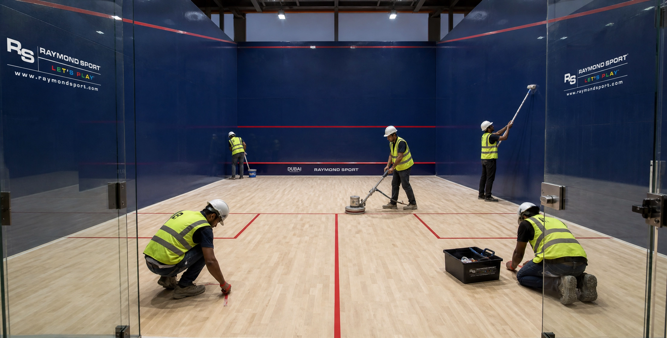 Squash court refurbishment and re-plastering in progress in Dubai by Raymond Sport